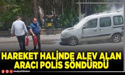 Hareket halinde alev alan aracı polis söndürdü