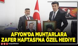Afyon’da Muhtarlara Zafer Haftası’na özel hediye