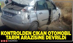 Kontrolden çıkan otomobil tarım arazisine devrildi