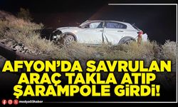Afyon’da savrulan araç takla atıp şarampole girdi!