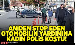 Aniden stop eden otomobilin yardımına kadın polis koştu!