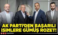 AK Parti’den başarılı isimlere gümüş rozet!