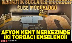 Afyon kent merkezinde iki torbacı enselendi!