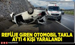 Refüje giren otomobil takla attı 4 kişi yaralandı