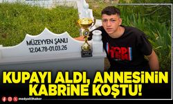 Kupayı aldı, annesinin kabrine koştu!