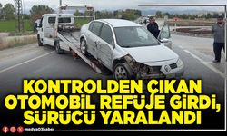 Kontrolden çıkan otomobil refüje girdi, sürücü yaralandı