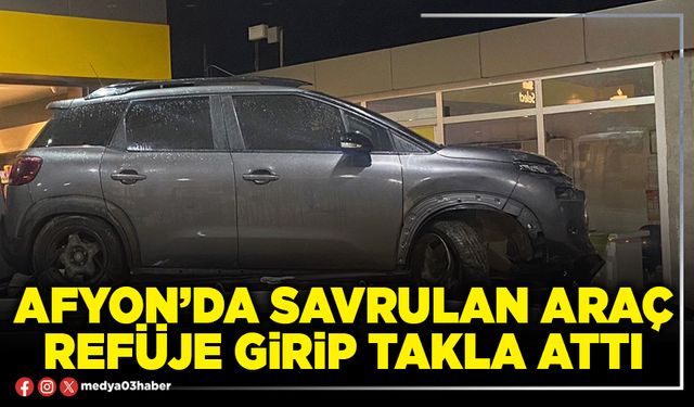 Afyon’da savrulan araç refüje girip takla attı