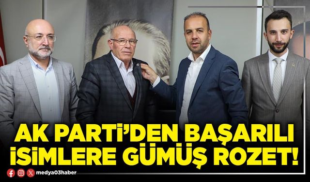 AK Parti’den başarılı isimlere gümüş rozet!