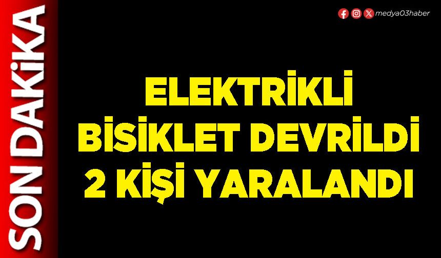 Elektrikli bisiklet devrildi 2 kişi yaralandı