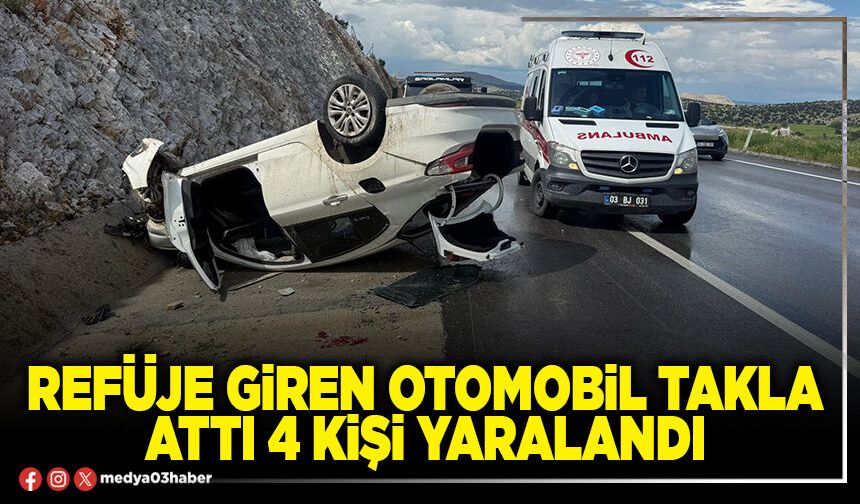 Refüje giren otomobil takla attı 4 kişi yaralandı
