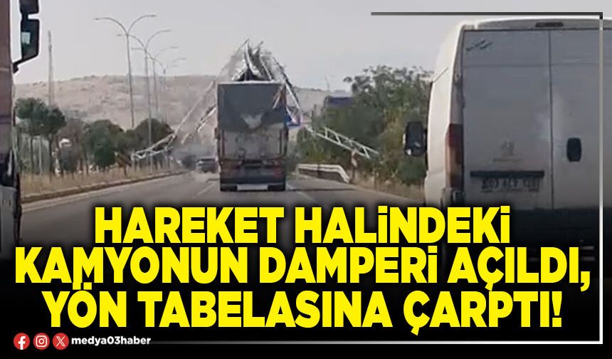 Hareket halindeki kamyonun damperi açıldı, yön tabelasına çarptı!