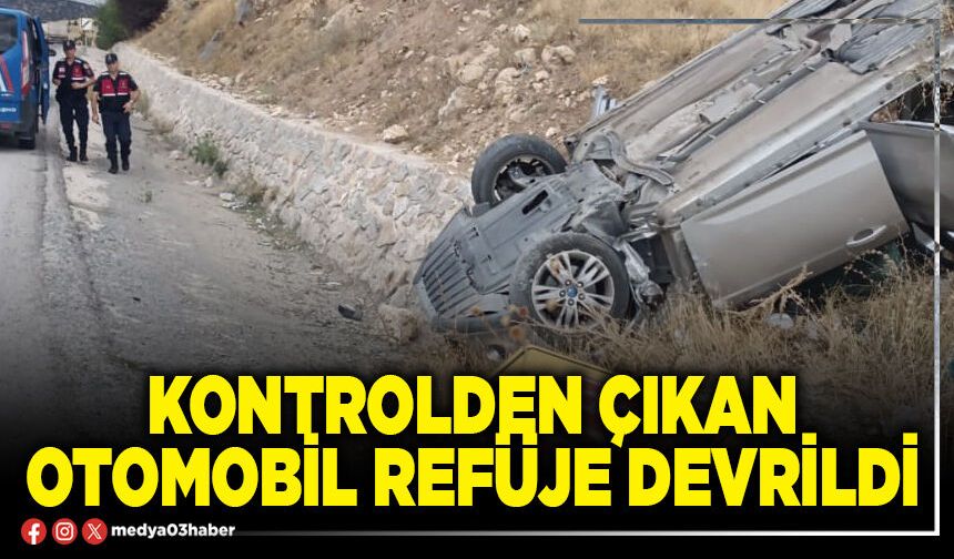 Kontrolden çıkan otomobil refüje devrildi